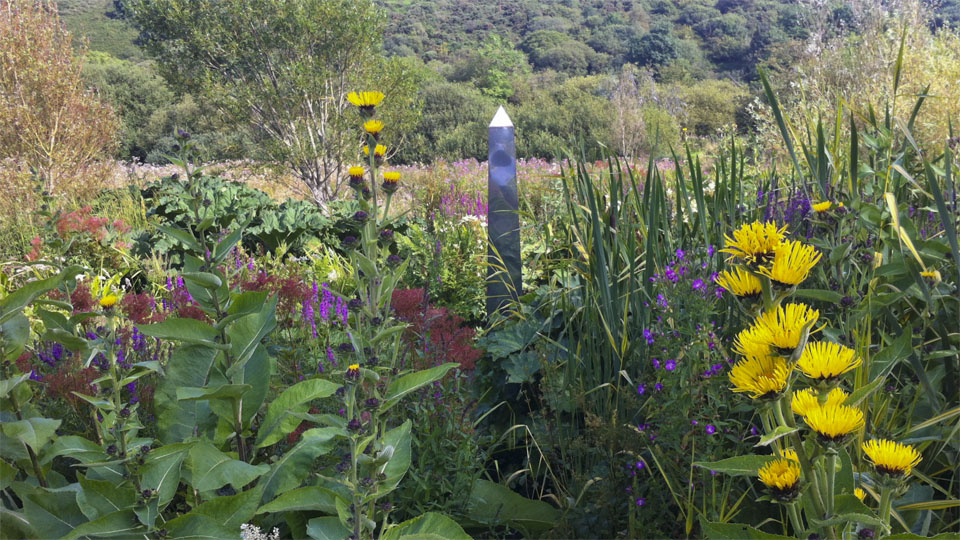 Bog garden with stainless steel obelisk